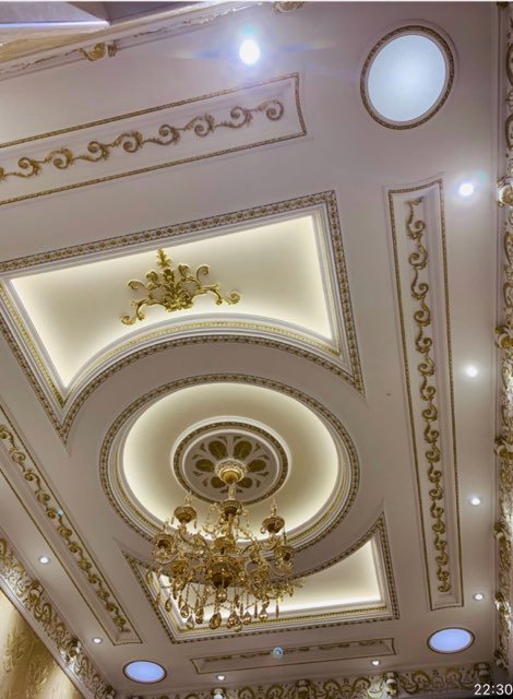 Custom coffered ceiling with decorative trim completed by Handy Pro Home Services